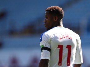 BIRMINGHAM, ENGLAND - JULY 12: Wilfried Zaha of Crystal Palace looks on during the Premier League match between Aston Villa and Crystal Palace at Villa Park on July 12, 2020 in Birmingham, England. Football Stadiums around Europe remain empty due to the Coronavirus Pandemic as Government social distancing laws prohibit fans inside venues resulting in all fixtures being played behind closed doors.