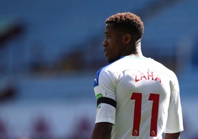 BIRMINGHAM, ENGLAND - JULY 12: Wilfried Zaha of Crystal Palace looks on during the Premier League match between Aston Villa and Crystal Palace at Villa Park on July 12, 2020 in Birmingham, England. Football Stadiums around Europe remain empty due to the Coronavirus Pandemic as Government social distancing laws prohibit fans inside venues resulting in all fixtures being played behind closed doors.