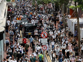 Anti-national security law protesters march on the anniversary of Hong Kong's handover to China from Britain, in Hong Kong, on July 1.