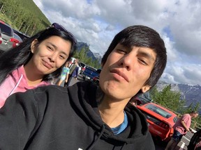 Devon Ernest and his girlfriend Dionne Durocher are shown in this undated handout photo. The boyfriend of a woman killed when the sightseeing bus the couple was on rolled in the Rocky Mountains believes she would still be alive had passengers been wearing seatbelts. Devon Ernest was with his girlfriend Dionne Durocher and his cousin in Jasper National Park last weekend when the trio boarded the off-road bus to head up to the Athabasca Glacier. Ernest, who is from Saskatchewan, says the last thing he remembers is hitting the roof of the bus, then waking up next to Durocher who was barley breathing and later pronounced dead.