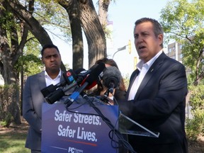 Spruce Woods Progressive Conservative candidate Cliff Cullen speaks during an announcement outside the Health Sciences Centre, in Winnipeg on Thursday, Aug. 22, 2019. Manitoba is expanding the use of a tool created to help officers respond when people are experiencing a mental-health crisis, becoming the first jurisdiction to provide it for every police force in the province.