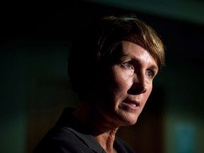 B.C. Representative for Children and Youth Mary Ellen Turpel-Lafond speaks to a reporter in Vancouver, B.C., on Friday November 13, 2015. A former judge investigating allegations of racism towards Indigenous people in British Columbia's health-care system is calling on patients, families, doctors and nurses to come forward with their stories.