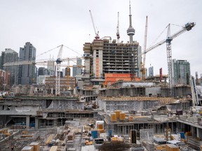 A construction site is shown in Toronto on Wednesday March 18, 2020. When the time comes for Canada to turn its attention to post-pandemic stimulus, a group of finance and policy experts says Ottawa needs to heavily invest in green infrastructure projects, including energy efficient buildings, to secure an economic recovery with staying power.