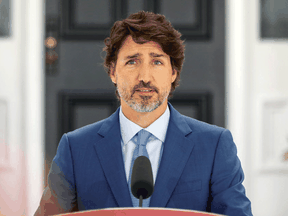 Prime Minister Justin Trudeau speaks to reporters at Rideau Cottage in Ottawa, July 13, 2020.