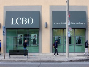 People wait outside of the LCBO (Liquor Control Board of Ontario) to purchase alcohol as the number of coronavirus disease (COVID-19) cases continue to grow in Toronto, Ontario, Canada April 9, 2020.
