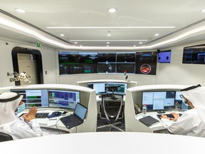 Staff monitor the progress of the Hope Probe in the mission control room at the Mohammed Bin Rashid Space Centre in Dubai, United Arab Emirates, on Tuesday, July 28, 2020. The UAE successfully launched its Mars Hope probe from Japan’s Tanegashima Space Center using a Japanese rocket on July 19.