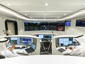 Staff monitor the progress of the Hope Probe in the mission control room at the Mohammed Bin Rashid Space Centre in Dubai, United Arab Emirates, on Tuesday, July 28, 2020. The UAE successfully launched its Mars Hope probe from Japan’s Tanegashima Space Center using a Japanese rocket on July 19.