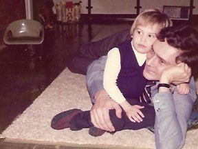 Michael Kovrig as a child with his father