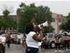 Educator for Detroit Public Schools Victoria Clark protests in support of a Black Groves High School student, who was jailed due to a probation violation of not keeping up with her online schoolwork in Pontiac, Michigan, July 16, 2020.