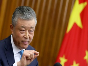 Chinese Ambassador to Britain Liu Xiaoming gestures during a news conference in London, Britain, Aug. 15 2019.