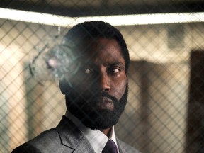 John David Washington in Tenet. If it opens, is it worth taking a coronaviral bullet to see?