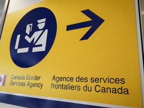 A Canada Border Services Agency (CBSA) sign is seen in Calgary, Alta., Thursday, Aug. 1, 2019. The federal auditor general says Canada's border agency has failed to promptly remove from Canada most of the people under orders to leave.THE CANADIAN PRESS/Jeff McIntosh