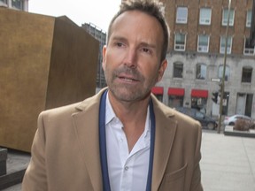 Former radio and television personality Eric Salvail arrives at the courthouse Wednesday, March 11, 2020 in Montreal. The Crown is asking a judge to accept new evidence in the sex-assault trial of former Quebec television star Salvail that they say indicates he tried to give a false impression of himself in court.THE CANADIAN PRESS/Ryan Remiorz