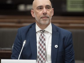 Parliamentary Budget Officer Yves Giroux waits to appear before the Commons Finance committee on Parliament Hill in Ottawa, Tuesday, March 10, 2020. The parliamentary budget office says it could cost over $98 billion to provide almost all Canadians with a basic income for six months beginning this fall.