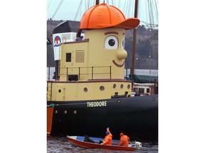 Boaters wave to Theodore Too, an ocean-going tugboat launched in Dayspring, N.S., Wednesday, April 19, 2000. The Theodore Tugboat replica vessel that's been a children's favourite for tours of the Halifax harbour is being put up for sale as COVID-19 causes a crash in tourism revenues in Nova Scotia.