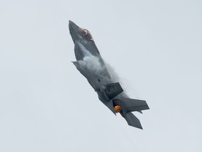 An F-35A Lightning II fighter jet practises for an air show appearance in Ottawa, Friday, Sept. 6, 2019. Fighter-jet makers are leading with promises of jobs and other economic spinoffs as they make their final pitches for why Canada should buy their planes to replace the military's aging CF-18 fleet.THE CANADIAN PRESS/Adrian Wyld
