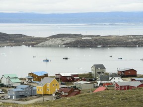 Small boats make their way through the Frobisher Bay inlet in Iqaluit on Friday, Aug. 2, 2019. Nunavut is reporting what may be its first case of COVID-19. Dr. Michael Patterson, the territory's chief public health officer, says in a release that there is a presumptive infection of a worker at the Mary River Mine, 176 kilometres southwest of Pond Inlet.