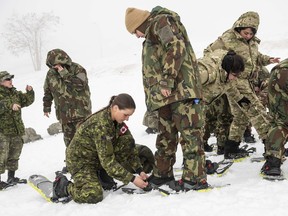 Cpl. Brenna Baverstock of the Winter Mobile Training Team conducts a snowshoe lesson for the soldiers of the Lebanon Border Regiment in the Bcharre region of Lebanon, on February 17, 2020. Canada's war against the Islamic State of Iraq and the Levant has quietly entered a new phase, resulting in plans to keep fewer troops in the Middle East even after the COVID-19 pandemic passes.