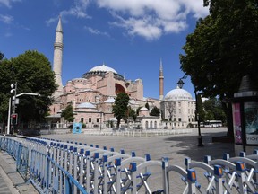 A picture taken on July 11, 2020 shows police fences set up around Hagia Sophia in Istanbul, a day after a top Turkish court revoked the sixth-century Hagia Sophia's status as a museum, clearing the way for it to be turned back into a mosque