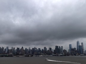 A New York Waterway Ferry crosses the Hudson River to New York City from New Jersey as Tropical Storm Fay was expected to sweep across the heavily populated northeastern United States as seen from Hoboken, New Jersey, U.S., July 10, 2020.