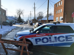 Police block off a street Friday morning during an RCMP national security investigation in Kingston, Ont. on Jan. 25, 2019.