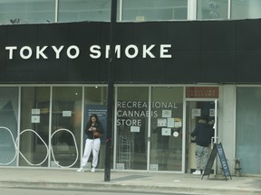 People pick up orders at a Tokyo Smoke cannabis store in Toronto on April 17.