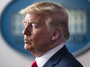 U.S. President Donald Trump pauses during a Coronavirus Task Force news conference in the briefing room of the White House in Washington, D.C., U.S., on Sunday, March 22, 2020.