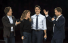 Co-founders Craig, left, and Marc Kielburger introduce Prime Minister Justin Trudeau and his wife Sophie Gregoire-Trudeau at WE Day in Ottawa, Nov. 10, 2015.