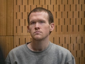 Brenton Tarrant, the gunman who shot and killed worshippers in the Christchurch mosque attack, listens as Crown prosecutor Mark Zarifeh delivers his submission during Tarrant's sentencing at the High Court in Christchurch, New Zealand, on Aug. 27.