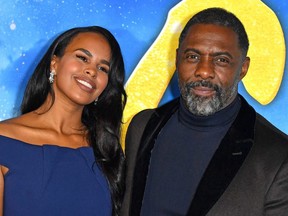 English actor Idris Elba (right) and wife Sabrina Dhowre Elba at the world premiere of "Cats" at the Alice Tully Hall in New York City, on December 16, 2019.
