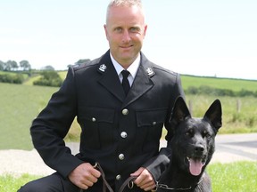 Max and his handler, officer Lloyd.