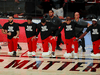 Fred VanVleet, far left, and other members of the Toronto Raptors are seen as both teams, coaches and officials kneel during the national anthem before a playoff game against the Brooklyn Nets on August 21, 2020.