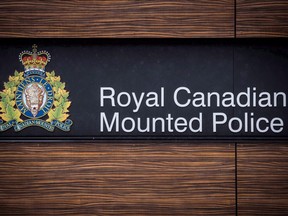 The RCMP logo is seen outside Royal Canadian Mounted Police "E" Division Headquarters, in Surrey, B.C., Friday, April 13, 2018.  ORG XMIT: GAC107