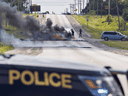 Ontario Provincial Police and Indigenous protesters at Caledonia, Ont., on Wednesday, August 5, 2020.