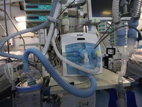 A ventilator, manufactured by Draegerwerk AG, stands beside an empty hospital bed in a converted hall at the Berlin Messe exhibition space in Berlin, Germany, on Friday, Aug. 14, 2020.