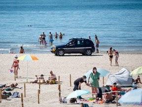 Critics accused French police officers, who had told topless women on the beach to cover up, of undermining the French way of life.

(Photo by CLEMENT MAHOUDEAU / AFP) (Photo by )