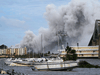 Plumes of smoke rise into the sky in a damaged area after Hurricane Laura passed through Lake Charles, Louisiana, August 27, 2020.