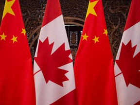 Canadian and Chinese flags are seen prior to a meeting between Prime Minister Justin Trudeau and Chinese President Xi Jinping at the Diaoyutai State Guesthouse in Beijing, in 2017.