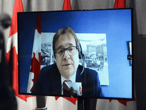 Environment Minister Jonathan Wilkinson speaks via video link during a press conference in Ottawa on May 14, 2020.