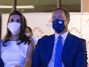 Peter MacKay, leadership candidate for the Conservative Party of Canada, waits for the voting results with his wife Nazanin Afshin-Jam MacKay in Ottawa on Sunday, Aug. 23, 2020.