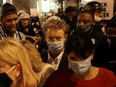 U.S. Senator Rand Paul (R-KY) is confronted by demonstrators during a protest in Washington, U.S. early August 28, 2020.
