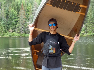 Sam Whaley of Algonquin Outfitters shows how easy it is to carry a canoe!