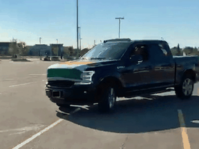 Sikh independence activists say this pickup truck, with an India flag on the hood, arrived as they were readying to protest against India at its consulate in Toronto. The driver asked to see a promoter of the event, and activists saw a pistol in the truck's cab. Police later charged five men with firearms offences after finding a loaded handgun in their vehicle.