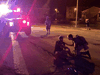 A wounded man is given help after being shot during a protest over the police shooting of Jacob Blake, a Black man, in Kenosha, Wisconsin, August 25, 2020.