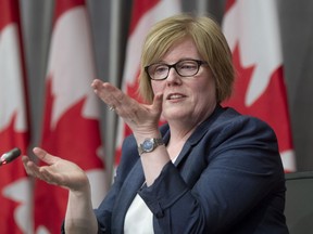 Employment, Workforce Development and Disability Inclusion Minister Carla Qualtrough gestures as she responds to a question during a news conference Thursday August 20, 2020 in Ottawa.