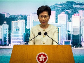 In this file photo taken on July 06, 2020, Hong Kong Chief Executive Carrie Lam speaks to the media about the new national security law introduced to the city at her weekly press conference in Hong Kong.
