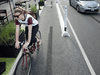 A cyclist rides across Danforth Avenue in Toronto.