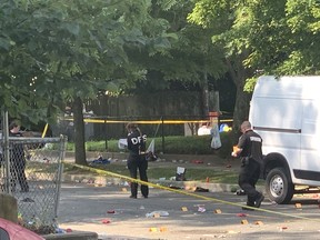 The scene in Washington, D.C., after an early-morning shooting left at least 21 wounded. MUST CREDIT: Washington Post photo by Marvin Joseph