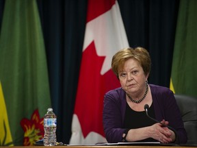Saskatchewan Finance Minister Donna Harpauer takes questions from reporters before releasing the province's budget at Saskatchewan's Legislative Building in Regina on Monday, June 15, 2020. The Saskatchewan government will provide its first update on the size of the deficit it says is a casuality of the COVID-19 pandemic.