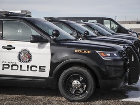 Police vehicles at Calgary Police Service headquarters in Calgary, Alta., Thursday, April 9, 2020. Police are investigating a Friday evening shooting that left two men dead and a third in hospital.